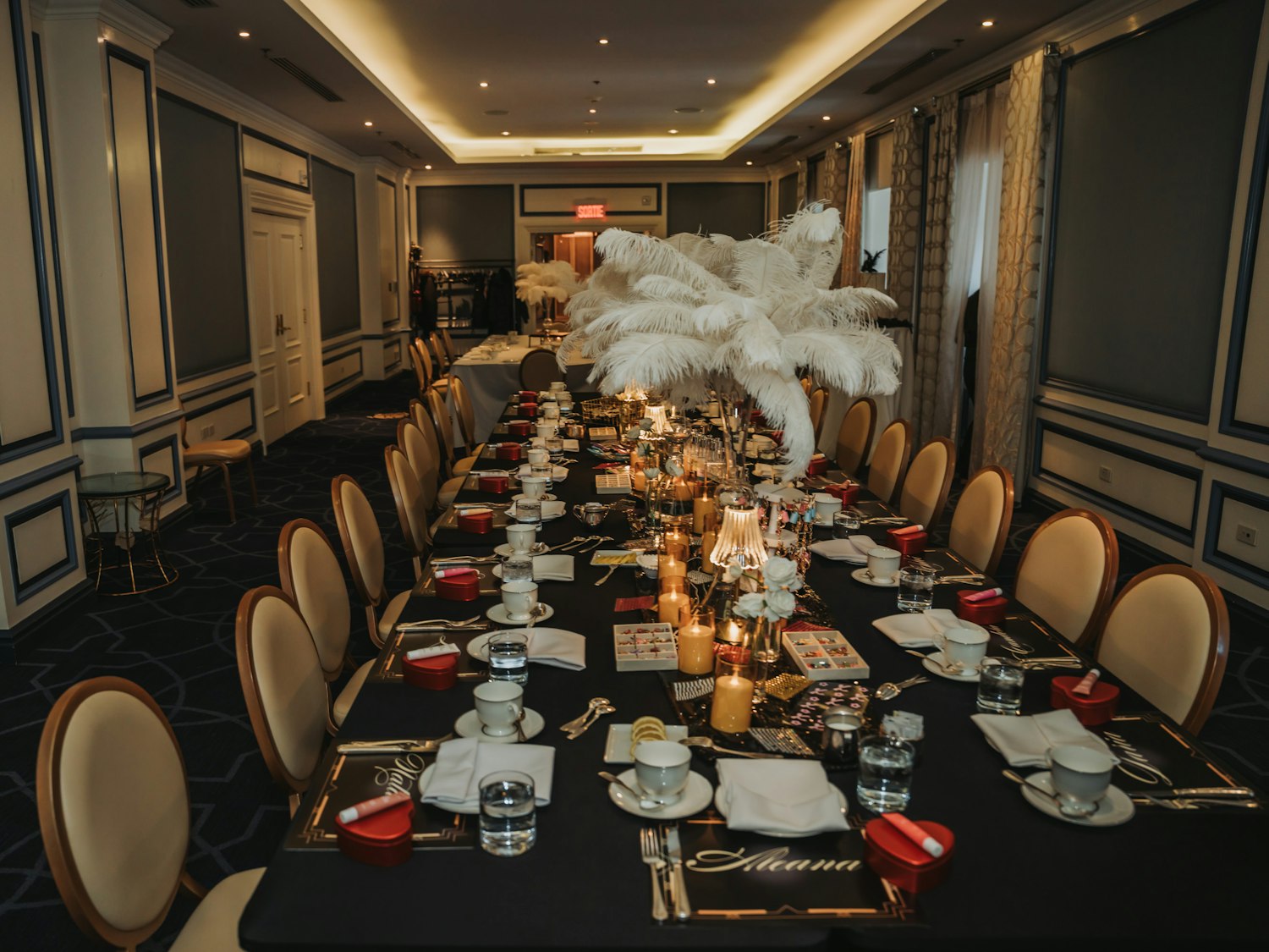 Gilded candelabra on a table laid for a private celebration